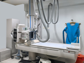 X-ray medical scan machine room with radiation protection vest
