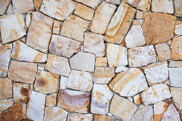 light stone on a wall that forms a texture