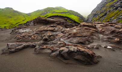 Fototapeta na wymiar red cliffs,Faroe