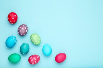 Colorful easter eggs on blue background