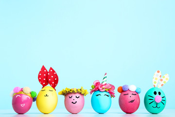 Cute easter eggs on blue background