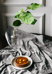 basket with nuts and caramel. Next is a vase with discs