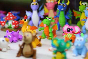 Naklejka premium Funny creatures made of playdough/ modeling clay. Preschool arts and crafts