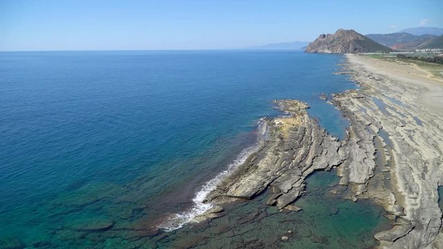 Antalya, Turkey - March 2019: Natural rock formations at Koru beach by the mediterranean sea, Gazipasa, Antalya province in Turkey