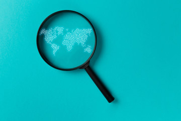 Concept information search. Magnifying glass with international map on blue background. World community and Neural network. New minimal creative concept. Searching information data on internet