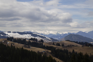Snowy tops of the mountains are still in spring