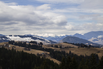 Snowy tops of the mountains are still in spring