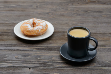 espresso with sweet donuts in sugar