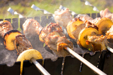 cooking  outdoor activities meat on skewers 