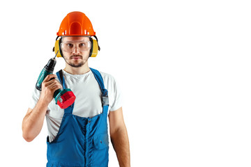 Male construction worker in orange helmet with screwdriver isolated on white background. Concept building, contractor.