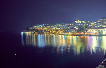 Fototapeta na wymiar View of the lake and the city of Ohrid at night