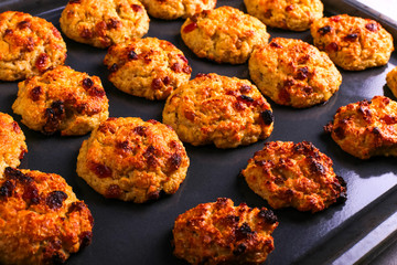 Baked cottage cheese and oatmeal cookies with raisins. Healthy nutrition, diet food.