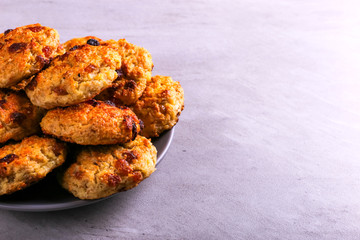 Baked cottage cheese and oatmeal cookies with raisins. Healthy nutrition, diet food.