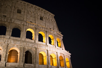 Fototapeta premium Colloseum at night - Roman Heritage Rome Italy