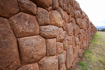 Inca wall in the ruins of Chinchero in Peru.