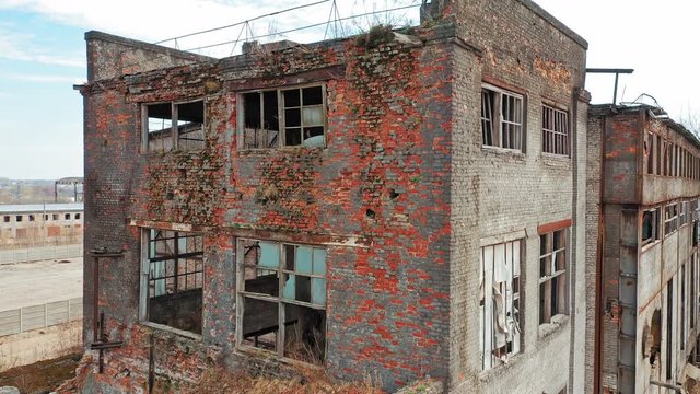 Abandoned ruined industrial factory building, ruins and demolition concept. Aerial view