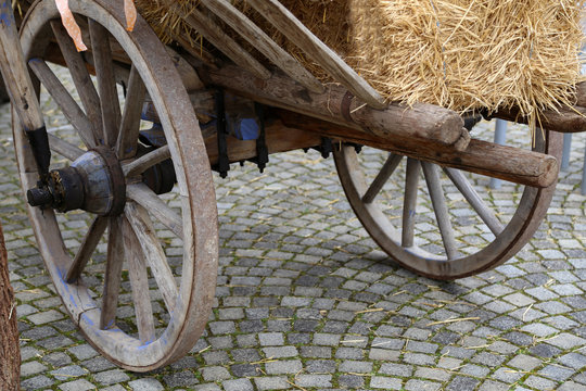 Old cart. Wheels of an old wooden carriage
