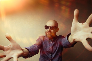 brutal portrait of a man fists force, unusual daring portrait aggressive man, beard, fists, hands,...