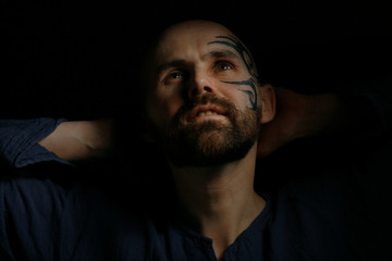 cheerful happy man portrait, young guy laughs, man looks at the frame, smile on the man's face, cheerful european