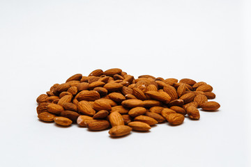 almonds isolated on white background closeup