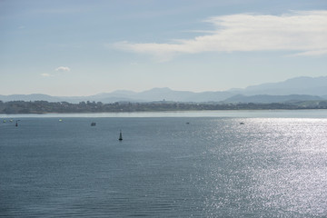 Fototapeta na wymiar Sunshine, View of the Santander Bay in Spain. Cantabrian Sea north of the Iberian Peninsula
