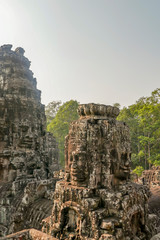 Fototapeta premium Close up of stone faces at Bayon Temple in Angkor Tom, Siem Reap, Cambodia