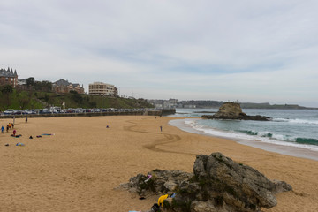 Camel beach famous for animal-shaped rock by the sea in the city of Santander, Spain