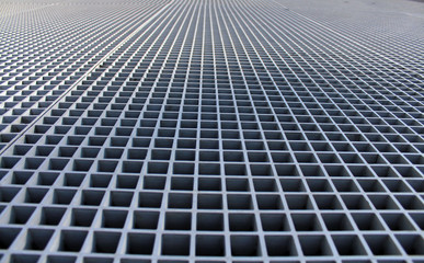 metal lattice in the sun close-up