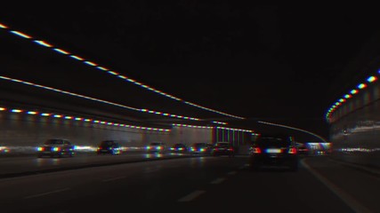 Point of view from the driver of a car driving in a dark tunnel. Glitch effect. Slow motion. - Powered by Adobe