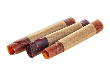 Sweet pureed fruit pastila isolated on white background. Fruit rolls.