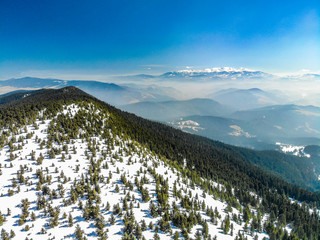 Mountains beaty panoramic on late winter from drone © marekzatko