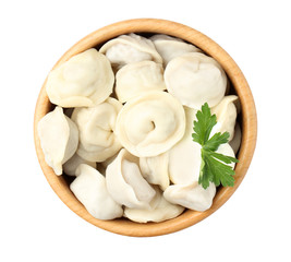 Bowl with tasty dumplings isolated on white, top view