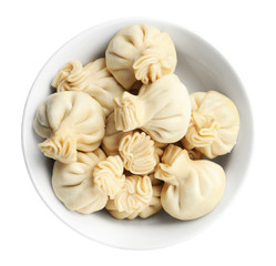 Bowl with tasty dumplings isolated on white, top view