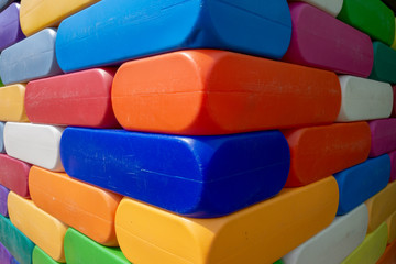 Abstract Background. Background with different colorful shapes plastic blocks . Geometric shapes in different colors.