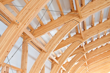 Roof construction of laminated veneer lumber. Building. Glued laminated timber. Building. Construction site 