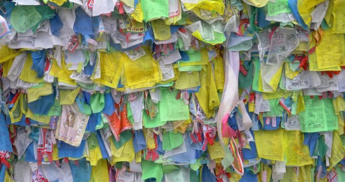 Colorful Tibetan prayer flags swaying in the wind in the temple, Ulan Ude Russia