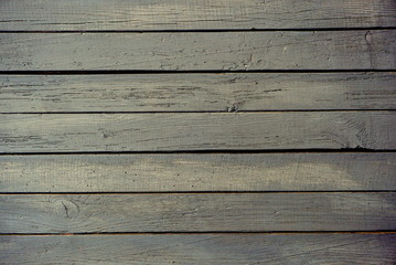 Obraz premium the horizontal old panel is painted in dark color, the background texture
