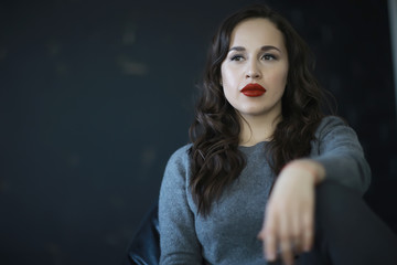 portrait of a glamorous woman / bright red lips, make-up, hairstyle, glamorous style. modern fashion concept