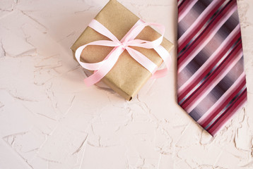 Happy father's day with tie and watch on beautiful background. Congratulations and gifts