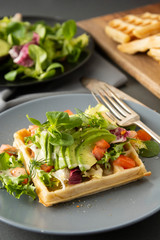 Belgian Waffles with avocado and tomatoes. Perfect breakfast for healthy food or lose weight.