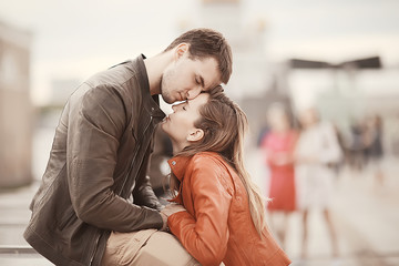 couple in love on a walk in Rome, Italy / young lovers hug, hug and love