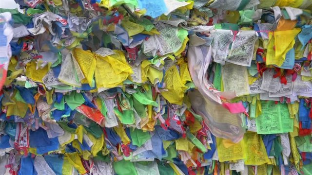 Colorful Tibetan prayer flags swaying in the wind in the temple, Ulan Ude Russia