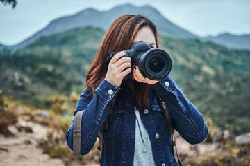 Woman is taking a photo shoot at nature