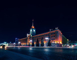 Fototapeta premium Light car trails in front of Yekaterinburg city center at night