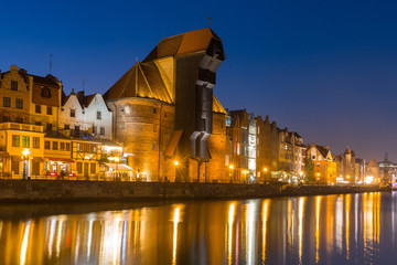 Naklejka premium Architecture of the old town of Gdansk with historic Crane at Motlawa river, Poland