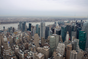 Fototapeta na wymiar Aerial view of Manhattan in New York City showing the classic high rise buildings and city scape in the USA