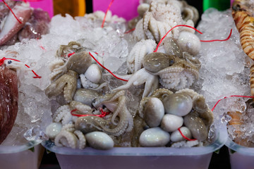 Fresh octopuses in the traditional fresh seafood market, Thailand