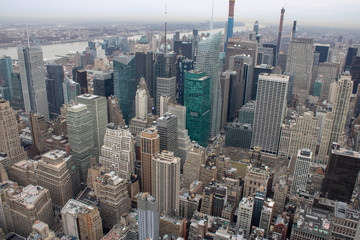 Aerial view of Manhattan in New York City showing the classic high rise buildings and city scape in the USA