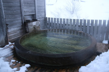 Obraz na płótnie Canvas 日本の風景　雪の鳴子温泉　雪の露天風呂