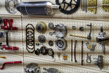 Motorcycle parts and accessories on the wall